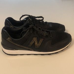 New Balance Black and Gold Sneakers